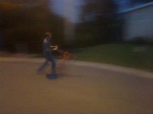 A terrible photo of Jason attempting a wheelie