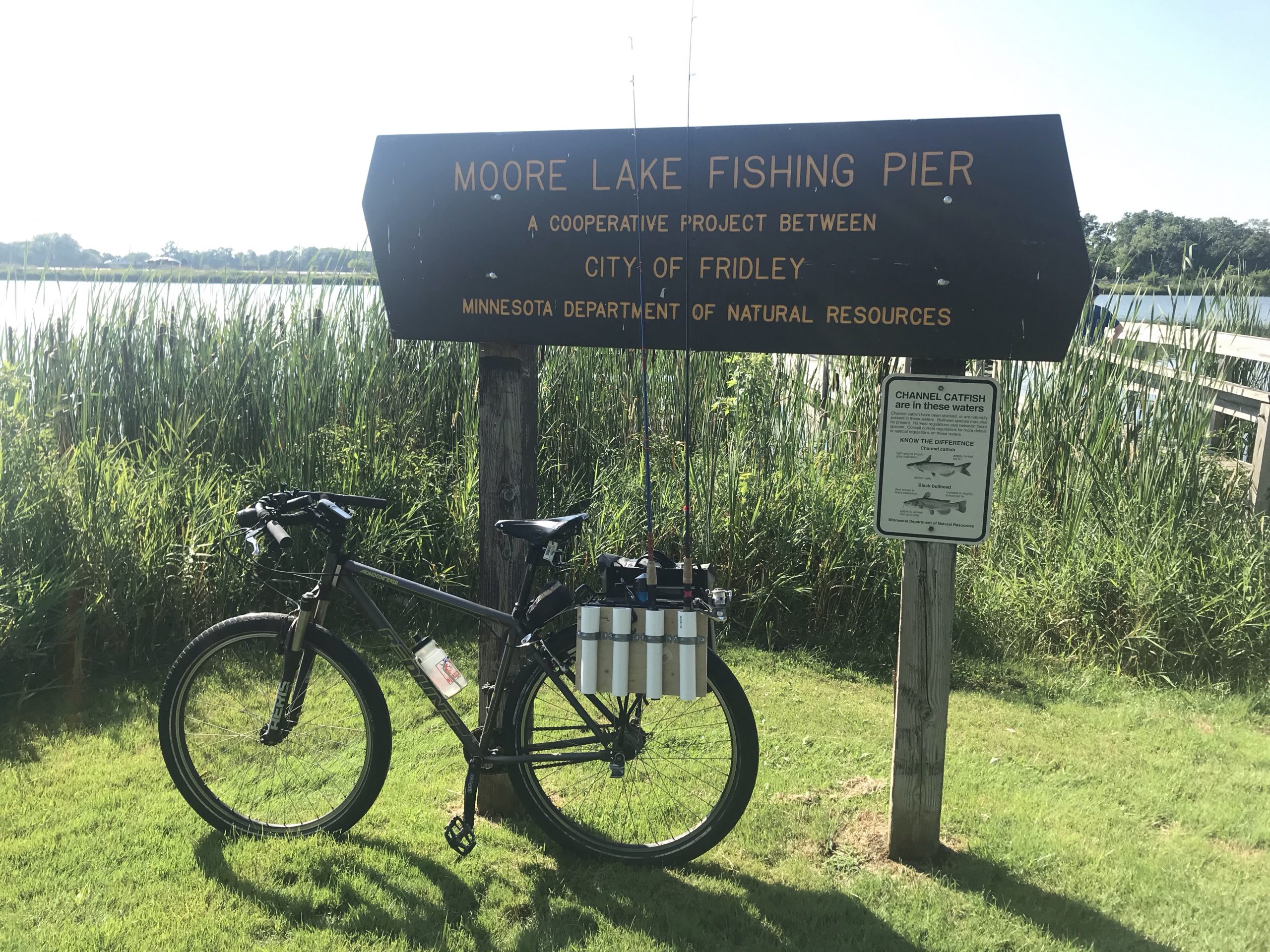 Carrying stuff by bike: fishing rods - Justin Foell